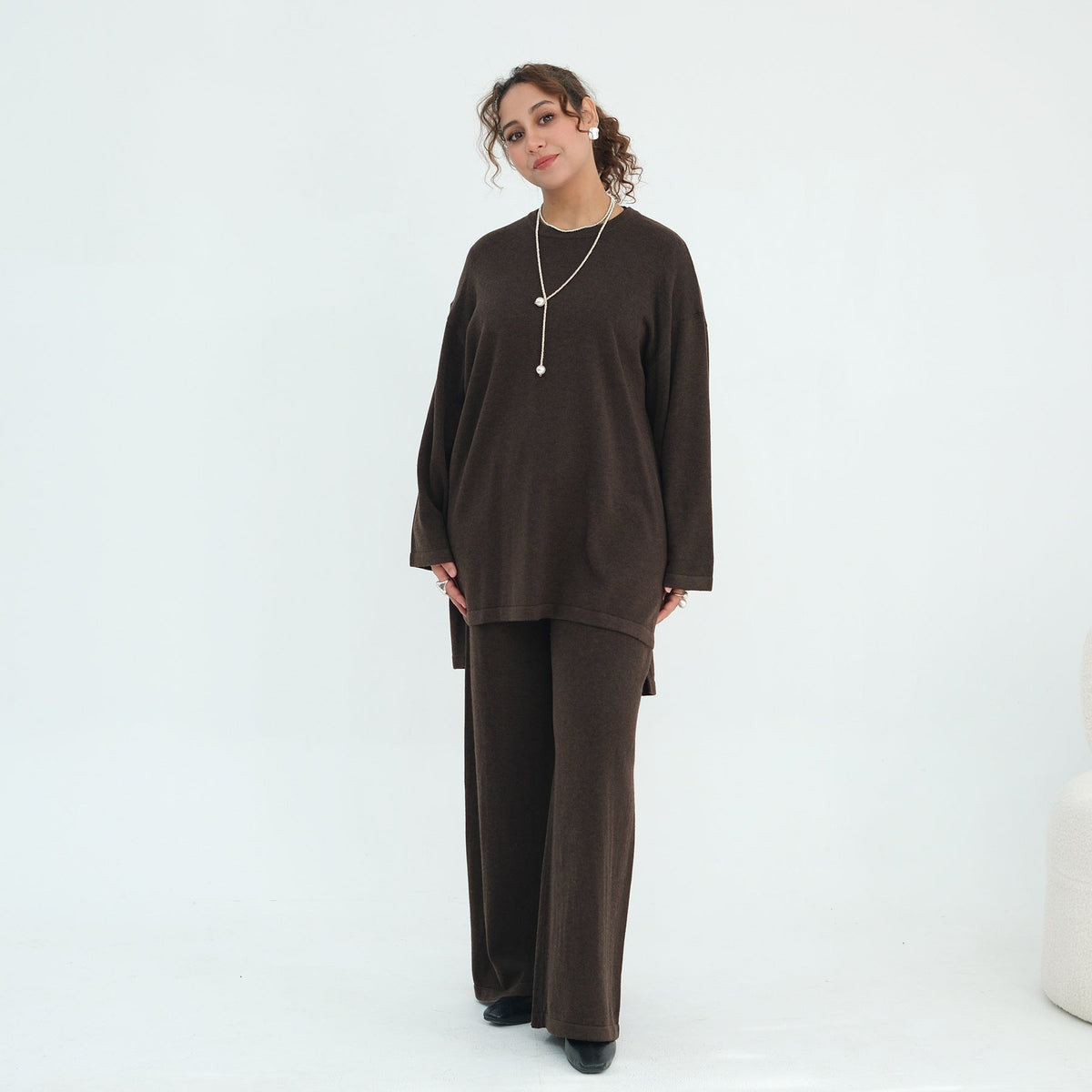 Longline cardigan with matching tie belt layered over set