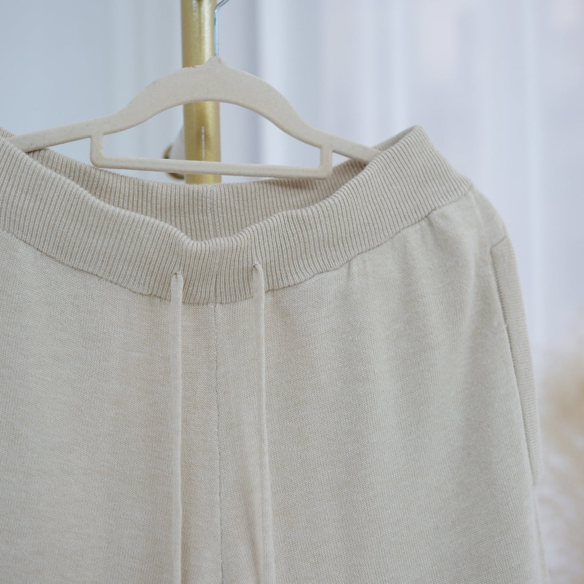 Three-quarter view of solid knit two-piece set