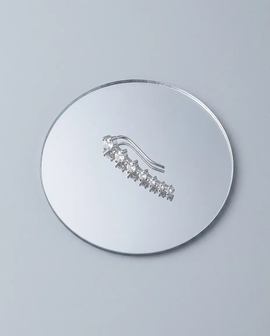 Crystal ear climber reflecting light from multiple angles