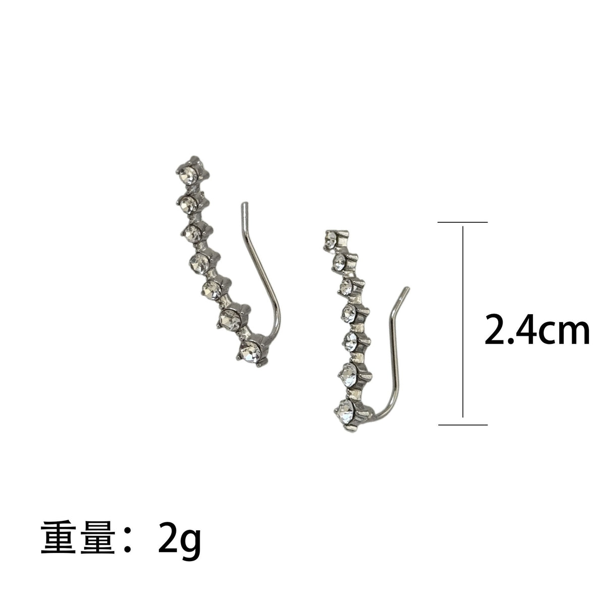 Close-up of radiant crystals on constellation ear crawler studs