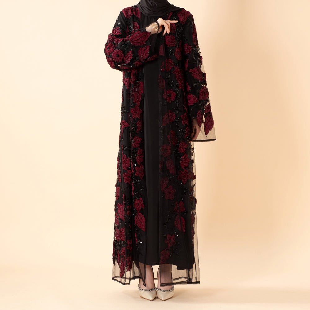 Sequin and bead embellishment detail on sheer illusion mesh abaya