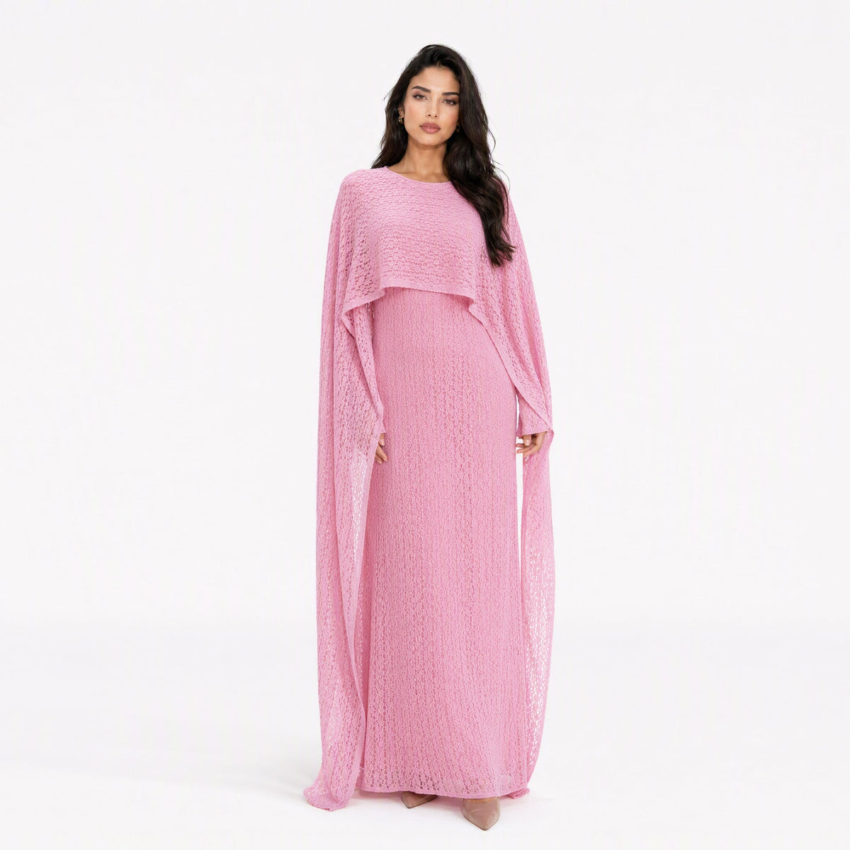 Sweeping batwing cape sleeve detail from shoulder to wrist