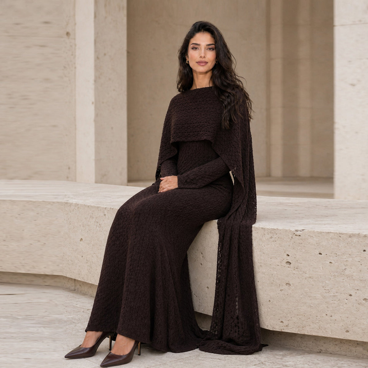 Straight A-line silhouette of the textured lace cape-sleeve dress