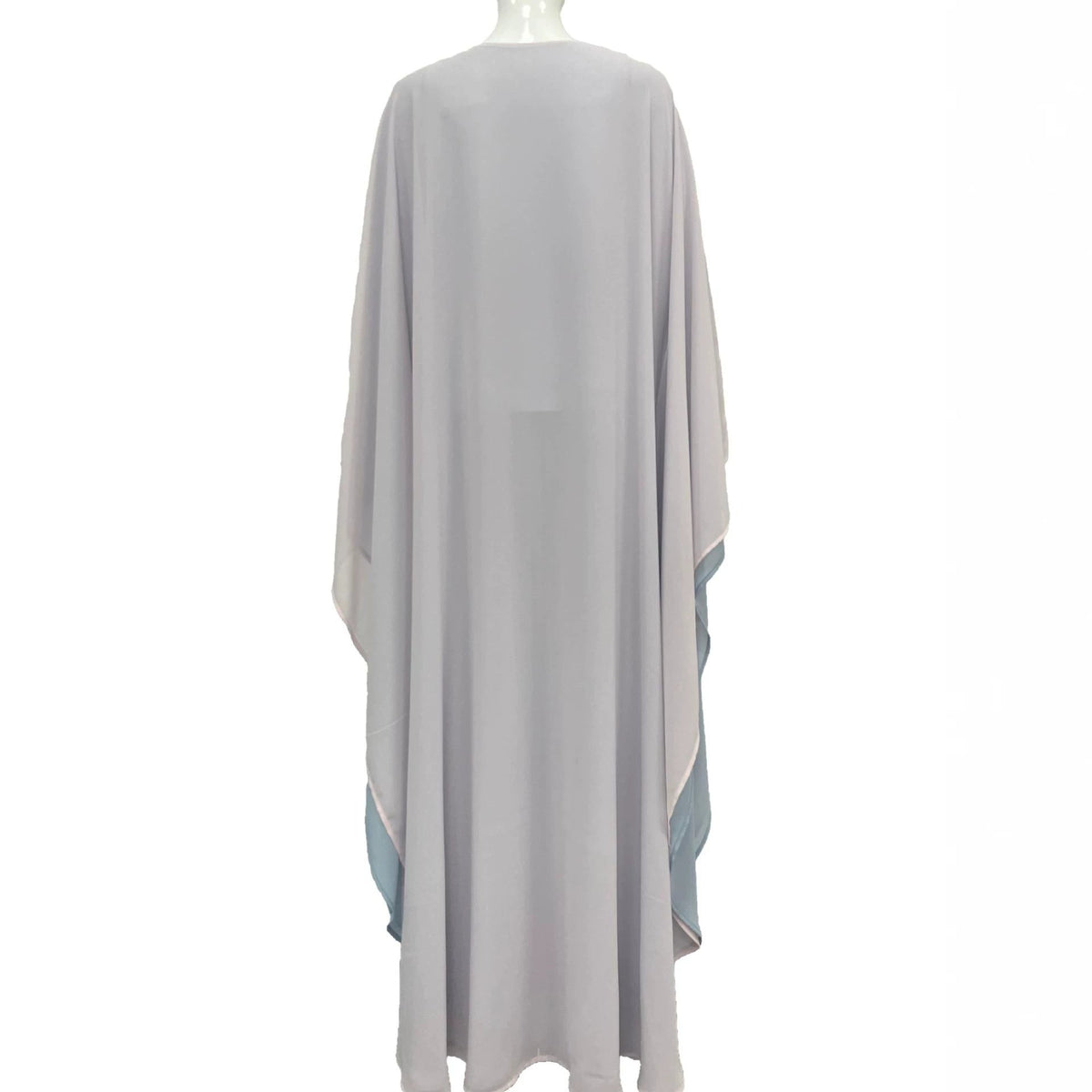 Side profile showing ice blue colour-block panels on batwing sleeve abaya