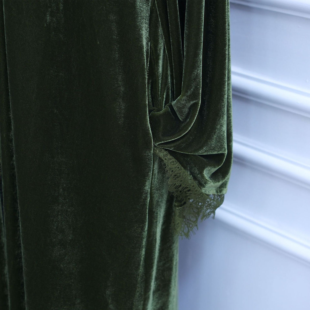 Soft velvet lustre finish detail on longline lace-panel abaya
