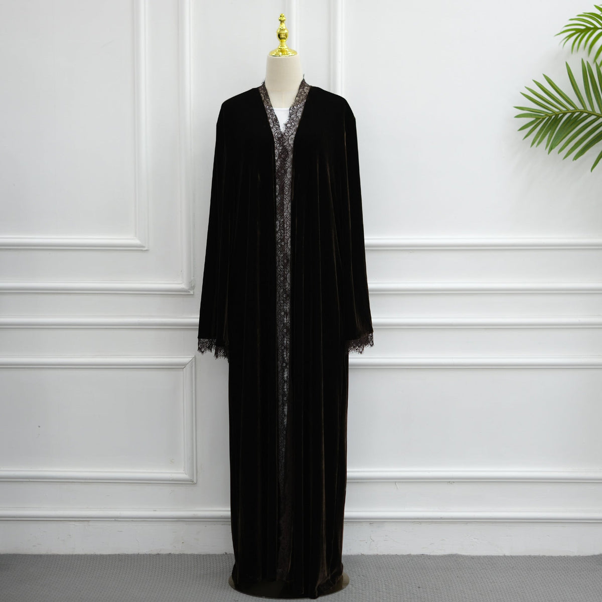 Three-quarter view of lace-panel velvet open abaya in motion