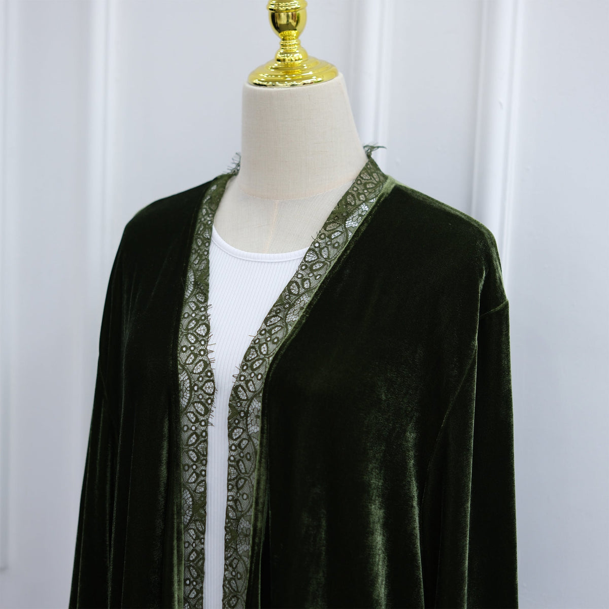 Back view of velvet-effect longline open abaya with lace panels