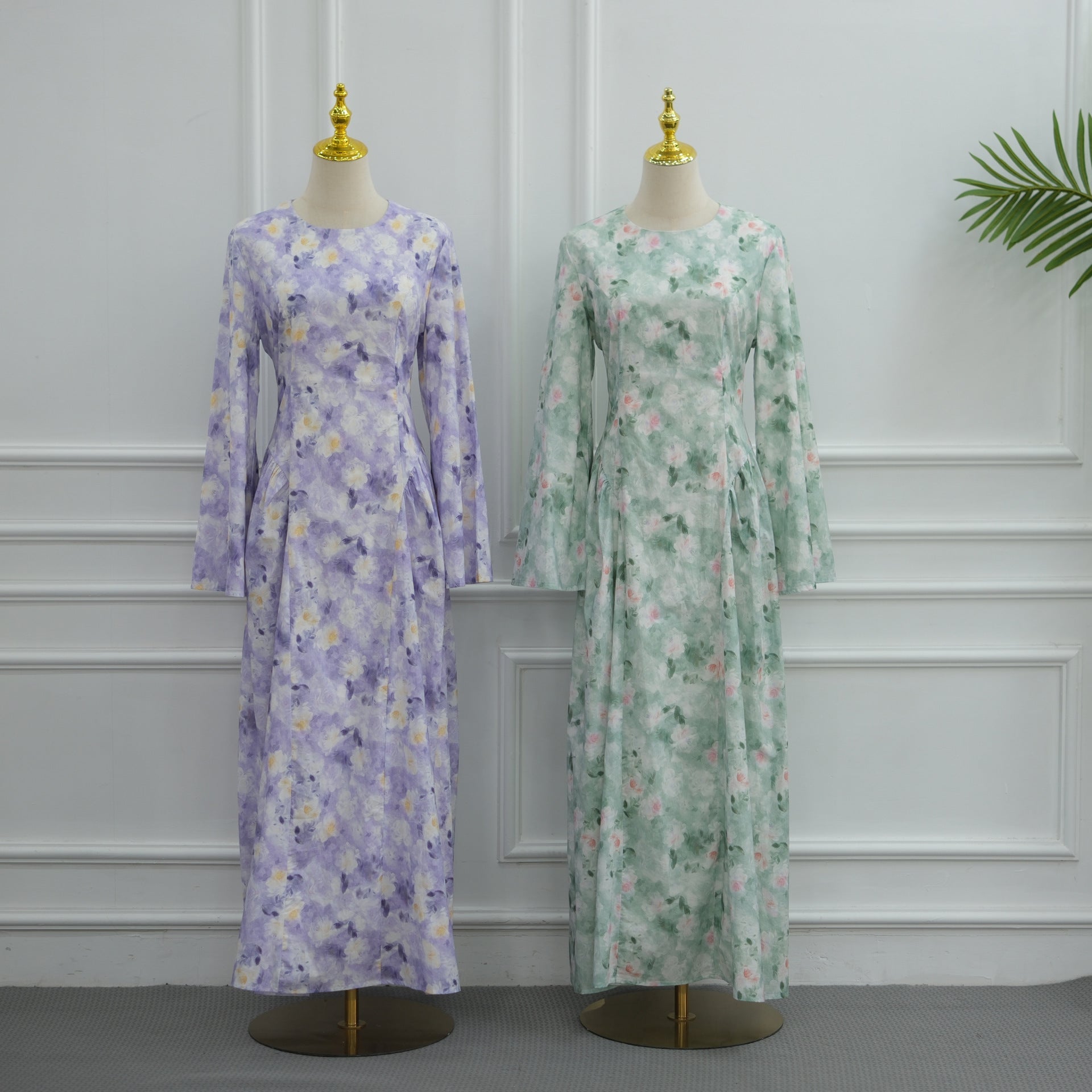 Back view showing lace-up corset panel detail on floral maxi dress
