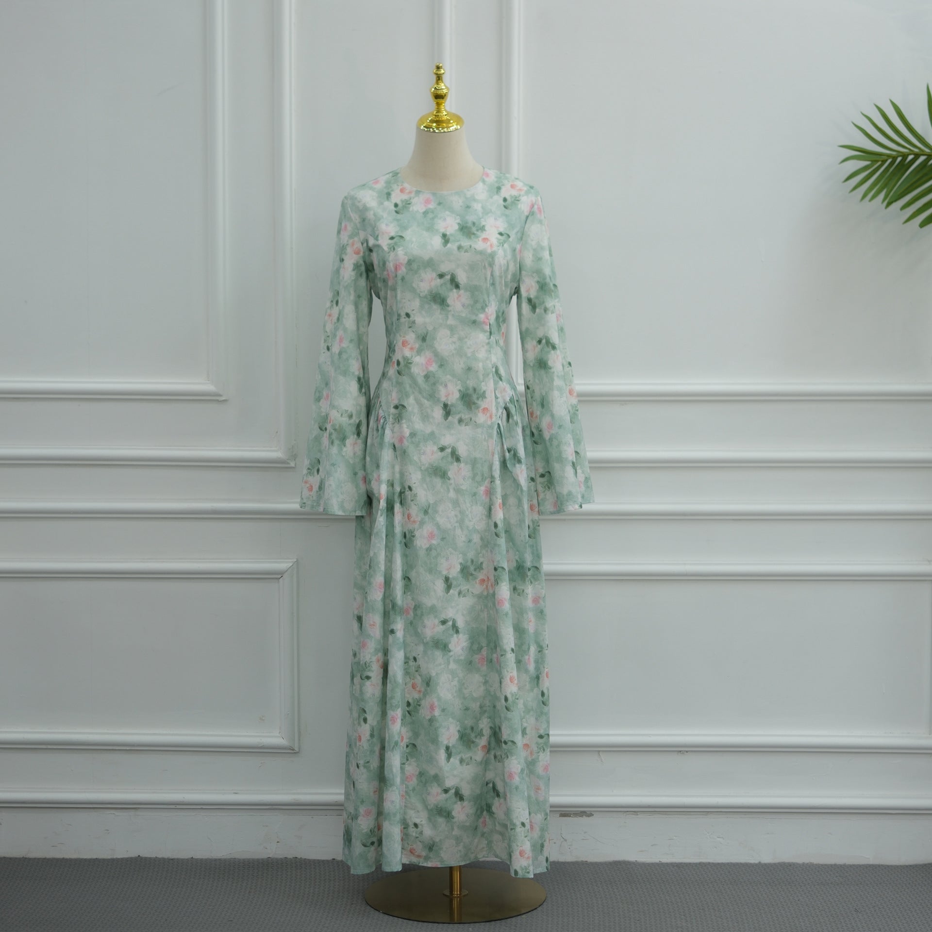 Full-length front view of watercolour floral maxi dress in mint green