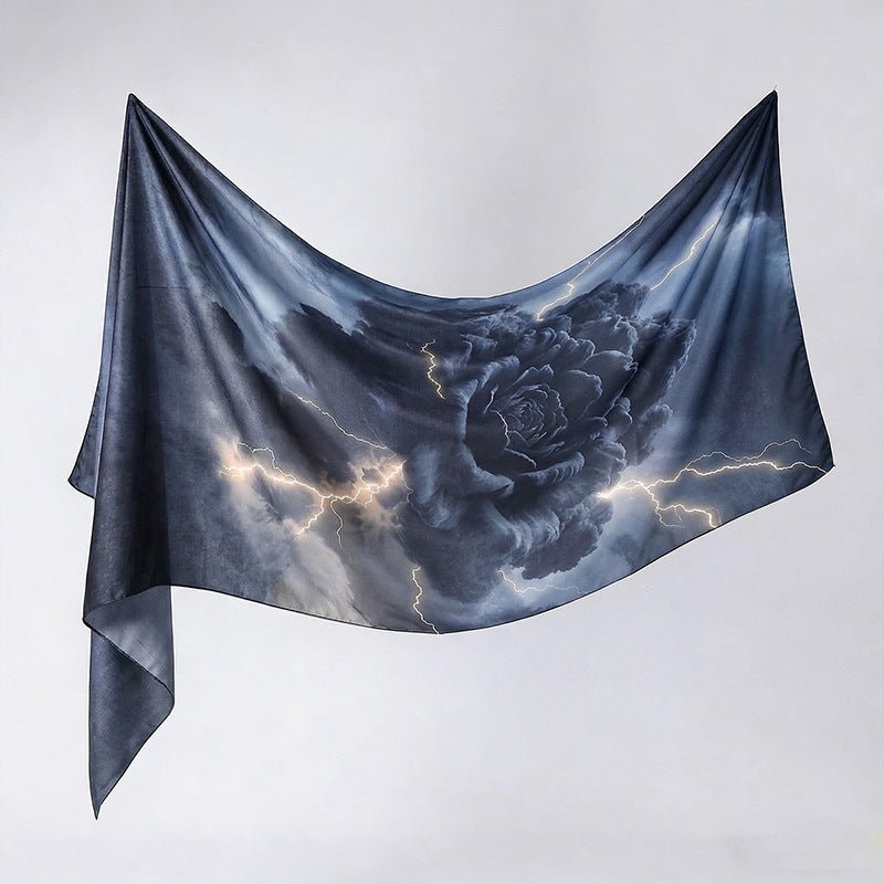 Ink-wash botanical print hijab shawl draped over shoulders