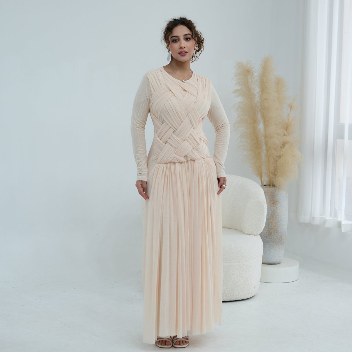 Side profile showing horizontal waist seam and pleated skirt silhouette