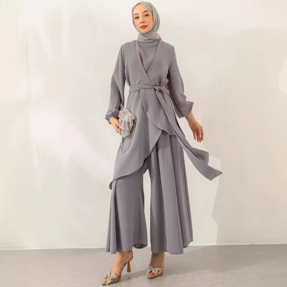 Side view of wide-leg trousers in matching matte fluid fabric